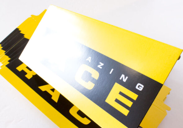 Amazing Race tear-strip envelopes