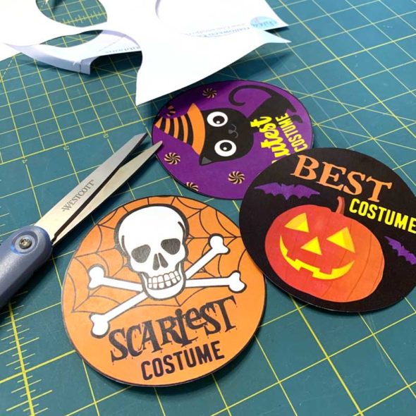 Halloween costume party prize ribbons and voting slips